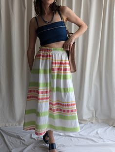 Women's vintage long white cotton skirt, colourful stripped pattern, elasticated waits, Y2K Style. Brand: Billi - made in Italy Year: 1990s Fabric: 100% cotton Size: M (model is UK 10-12, EUR 38-40, US 6-8, 1m81, 5'9) 26-30" Waist  35" Length Summer Striped Cotton Skirt, Striped Cotton Skirt For Summer, Striped Summer Skirt, Casual Cotton Skirt With Vertical Stripes, Retro White Skirt For Summer, White Vertical Stripes Bottoms For Beach, White Vertical Stripe Beach Bottoms, Striped Cotton Relaxed Skirt, Retro Cotton Beach Skirt