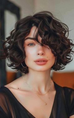 Showcase your bold and beautiful curls with a tightly coiled curly bob. This defined hairstyle adds structure and flair to your natural texture. Short Round Haircut Curly, Short Hairstyle Women Round Face Curly Hair, Short Curly Haircuts Round Face, Short Bob With Bangs Round Face, Medium Pixie Haircut, Curly French Bob With Bangs, French Bob Curly Hair, Curly French Bob, Fall Hairstyles For Short Hair