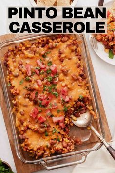 a casserole dish filled with beans and cheese