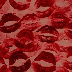 many red lips are lined up together