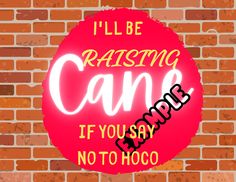 a neon sign that says i'll be raising cane if you say no to hoco