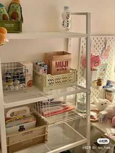 a shelf filled with lots of toys and other items