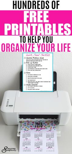 a printer that is sitting on top of a desk with the words, hundreds of free printables to help you organize your life