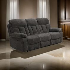 a living room scene with focus on the reclining sofa