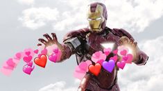 the iron man is holding hearts in his hands