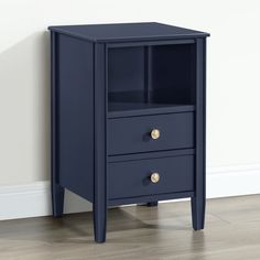 a blue night stand with two drawers on the bottom and one drawer in the middle