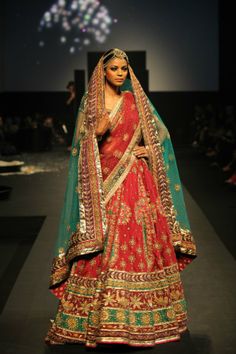 Rich colours like red, greens & gold represented seduction. Ritu Kumar Bridal, Mira Duma, Desi Bride, Indian Couture, Lehenga Designs, Indian Attire, Pakistani Bridal