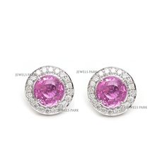 Pink sapphire diamond round cut earring studs gold | Natural pink sapphire halo diamond stud tops earrings gold | Pink sapphire stud gold GEMSTONE DETAILS : ✦ Gemstone : Pink Sapphire ✦ Gemstone Type : Natural ✦ Gemstone Size : 6 mm ✦ Gemstone Shape : Round ✦ Number of Gemstones : 2 ✦ Gemstone Weight : 2.35 Carats ✦ Gemstone Grade : AAA DIAMOND DETAILS : ✦ Diamond Type : Natural ✦ Diamond Size : 2.30 MM ✦ Diamond Color : F-G ✦ Diamond Clarity : Slightly included ✦ Diamond Cut : Excellent  ✦ Diamond Weight : 0.34 Carats METAL DETAILS : ✦ Metal : 14K/18K Gold ✦ Metal Color : Yellow / White / Rose Gold ✦ Setting : Flush Setting ✦ Ring Box : Yes SHIPPING DETAILS : ✦ Production time : 10-12 days ✦ Delivery time : 7-8 days ✦ Expedited shipping : Available ✦ Expedited shipping service : UPS ✦ Exp Gia Certified Classic Pink Sapphire Jewelry, Classic Gia Certified Pink Sapphire Jewelry, Elegant Gia Certified Pink Sapphire Jewelry, Gia Certified Sapphire Diamond Earrings, Gia Certified White Gold Pink Sapphire Jewelry, Wedding Pink Sapphire Earrings, Gia Certified Pink Fine Jewelry Earrings, Classic Pink Halo Jewelry, Formal Round Sapphire Diamond Earrings