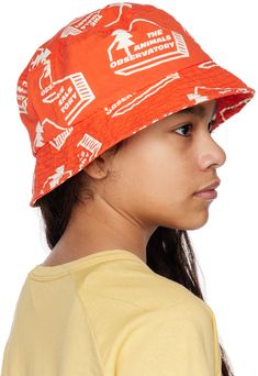 Cotton twill bucket hat in red. Logo pattern printed in white throughout. · Quilted brim · Twill browband · Machine-wash Supplier color: Red house The Animals Observatory Size: Head Circumference M: 21.25 / 54 cm L: 22.5 / 57 cm Adjustable Red Cotton Bucket Hat, Adjustable Orange Cotton Bucket Hat, Red Adjustable Cotton Bucket Hat, Orange Cotton Bucket Hat, Adjustable Red Bucket Hat, Playful Red Bucket Hat, Logo Pattern, Red House, Starfish