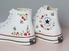 Custom embroidery converse/Strawberry and bees embroidered shoes/Custom converse high tops embroidered strawbery/ Strawberry sneakers gift  💸 Price includes Converse Shoes and floral embroidery as shown 🌸 You can send me your Converse/Vans shoes or I can buy them for you. We stock all the Converse and Vans shoes you want, if you want other Converse/Vans shoes in the store, please message us. Your embroidered Converse/Vans shoes will be available for shipping in 7-15 days. 🌸 I started hand embroidering on fashionable clothes and handbags over 20 years ago - and now on CONVERSE/VANS shoes, an American icon, a must-see classic! I'm excited to give your Chuck Taylor shoes a new look with beautiful, nature-inspired embroidery. All images, designs and text used by CUSTOMSHOEDESIGNSOHO are cop Strawberry Sneakers, Custom Converse High Tops, Embroidery Converse, Converse Fits, Converse Chuck 70s, Chuck Taylor Shoes, Embroidered Converse, Cute Converse, Custom Converse