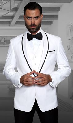 Picture looking sharp in this head twisting white tuxedo with black trim by Statement. Featuring a full ensemble with the Modern fit jacket with white trim side vents, matching white vest with flat front modern fitting pants, this black tuxedo has the style to get you the spotlight. Bow Tie Included. Made of Microfiber. This suit comes in a Modern Fit. If you prefer regular fit, you will need to order the next size larger. The sizes displayed are jacket sizes. Pant sizes for 36-46 chest will be 6 inches smaller than the jacket size. Pants sizes for 48-52 will be 5 inches smaller, and 54-56 the pant sizes will be 4 inches smaller than the jacket size. Ex. Size 40 Regular Jacket comes with size 34 Waist Pants Wedding Suits For Men Black, White Prom Suit, Mens Wool Vest, Mens Black Vest, Prom Tuxedo, Italian Suit, Statement Outfit, Suits Clothing, Prom Suits