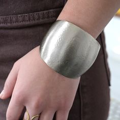 Be transported to Ancient Greece with this matte metallic cuff! With its sleek sculptural arch, it's a perfect showstopper. Complete the look with our Kantha jewelry or mix it with other metallic pieces. Measures 2 1/2" wide; adjusts to fit most wrists. Crafted from a brass metal mix. Handmade by women artisans in India. Goddess Vibes, Grecian Goddess, Matte Metallic, Women Artisans, Ancient Greece, Brass Metal, Metal Jewelry, Fair Trade, Fashion Statement