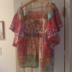 Woman's Top, Brand, Modaposa, Size Large, Very Colorful, Flirty, Fun, Sexy, Off The Shoulder With Bell Sleeves. New With Tags. Lots Of Nice Quality Detail With Tassels, Embroidery And Sequins, Etc. Sale Price I Paid Was $35.00 Originally $50. Beachwear V-neck Top For Festivals, Printed V-neck Blouse For Beach Season, Summer Beach Cover-up Flowy Blouse, Summer Multicolor Print V-neck Blouse, Summer V-neck Blouse In Multicolor Print, Summer V-neck Blouse With Multicolor Print, Bohemian Multicolor Print Blouse For Summer, Bohemian Multicolor Print Beach Blouse, Bohemian Multicolor Print Blouse For Beach