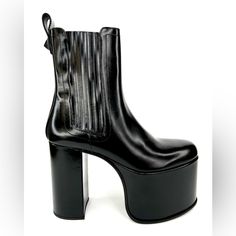 Valentino -Condition: Brand New Item. -All Of Our Items Are 100% Authentic. -Does Not Include Box. -Size: Eu 39 -Color: Black. -Model: Club 125mm -Make A Statement This Season In Valentino's 'Club' Boots. -Crafted From Smooth, Glossy Calf Leather. -Stud Embellished On The Heel. -Elastic Gores At Sides. -Block Heel Measures: 5" (125mm). -Platform Measures: 3.5". -Shaft: 6.5: Height. -Made In Italy. -Retails For $1,690.00 -Item Ships Out Within 24 Hours. Evening Ankle Platform Boots With Sculpted Heel, Chic High Ankle Platform Boots With Leather Sole, Chic Platform Boots With Sculpted Heel And Calf Leather, Chic Platform Boots With Sculpted Heel In Calf Leather, Chic Calf Leather Platform Boots With Reinforced Heel, Luxury Leather Boots For Party, Modern High Heel Calf Leather Platform Boots, Luxury High Heel Calf Leather Platform Boots, Modern High Heel Platform Boots In Calf Leather