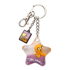 Bring Jake the Dog with you wherever you go with this Adventure Time enamel pendant keychain! With an adorable design, this keychain features an enamel portrait of Jake along with the pooch floating in a liquid-filled star. Add some Adventure Time style to your accessory collection. A must-have for any Adventure Time fan! Officially licensed Adventure Time collectible. Adventure Time Keychain, Adventure Time Jake The Dog, Adventure Time Jake, Adventure Time Style, Jake The Dog, Ron Burgundy, Pendant Keychain, Star Wars Ahsoka, Jake The Dogs