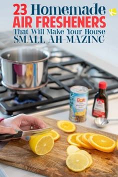 a woman cutting up lemons on top of a wooden cutting board next to a stove