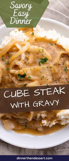 a close up of a plate of food with gravy on it and the words, savory easy dinner cube steak with gravy