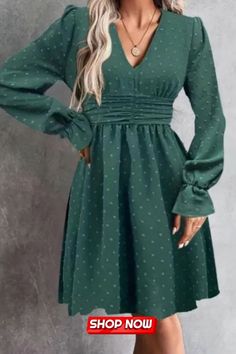 This elegant Swiss Dot shirred dress embodies sophistication with its V-neck and long sleeves. The delicate Swiss Dot fabric adds a touch of grace, while the shirred design offers a flattering silhouette. Perfect for various occasions, this dress exudes timeless elegance and style. Green Non-stretch V-neck Midi Dress, Green V-neck Mini Dress For Winter, Green V-neck Mini Dress For Fall, Casual Polka Dot V-neck Midi Dress, Casual Polka Dot V-neck Mini Dress, Spring V-neck Polka Dot Dress, Polka Dot V-neck Dress For Party, Polka Dot V-neck Mini Dress For Party, Polka Dot V-neck Party Dress