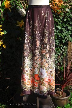 The style reflects a key fashion shape and print of the mid to late 1970s when the maxi / boho look was at it’s height. It is made in super floor length printed fabric marrying the maxi skirt trend with the trend for textiles with a natural, floral themed border. Browse and buy https://www.etsy.com/uk/listing/230609464/vintage-english-lady-floral-1970s-maxi?ref=shop_home_active_1 Skirt Trends, Boho Look, Print Skirt