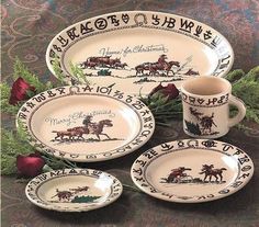 four plates and two cups on a table with flowers in the background, one has a horse design