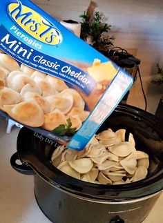 a bag of chips sitting in a crock pot