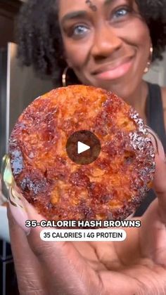 a woman holding up a piece of pizza in front of her face with the caption, calorie hash browns 35 calories 16 protein