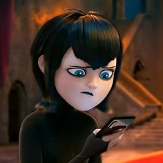 the animated character is looking at her cell phone while she's dressed in black