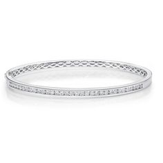 Memoire 18k white gold 58x52mm bangle bracelet with 33 channel set diamonds weighing .95cts , hinged clasp 18k White Gold 58x52MM Channel set 33 Diamonds = .95cts GH-SI quality Hinged Clasp Classic Channel Set Diamond Bracelet, Formal Diamond White Channel Set Bracelet, Timeless Bangle With Pave Setting For Formal Occasions, Formal Diamond Tennis Bracelet Channel Set, Formal White Gold Diamond Bracelet Channel Set, Classic Diamond Bracelet With Channel Set, White Gold Channel Set Tennis Bracelet For Anniversary, Classic Diamond Pave Bangle Bracelet, Anniversary White Gold Channel Set Diamond Bracelet