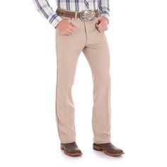 As every cowboy knows all too well, the day doesn't always go as planned. When you need to be dressed up and out of the house in a hurry, Wrangler dress jeans are your greatest ally. Our men's Wrancher dress jeans feature a regular fit with modern styling and are made of 100% texturized, woven polyester stretch twill to keep you comfortable on all occasions. Plus, they come with plenty of pocket space for storing your essentials. Best of all, these dress jeans for men feature a soil release fini Wrangler Wrancher Pants, Wrangler Jeans Mens Butts, Men’s Wrangler Jeans, Tall Jeans, Big Clothes, Big & Tall, Jeans Dress, Jean Outfits, Short Pants