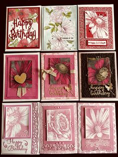 many cards are arranged in pink and white with flowers on the front, one has a heart