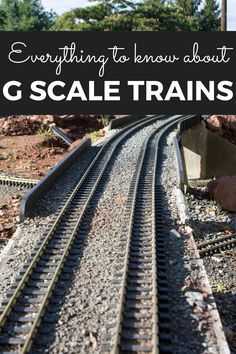 a train track with the words everything to know about g scale trains on it's side