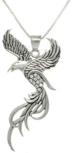 From the outstretched feathery wings and long flowing tail to the gorgeous Cubic Zirconia accents, the eye-catching details of this .925 Sterling Silver Eagle Phoenix Necklace are extraordinary. This unisex pendant is strung on an 18-inch sterling silver box chain that secures with a spring ring clasp. The phoenix has captivated the imagination of many cultures, as a symbol of the sun, rebirth, and resurrection. This mighty "fire bird" is said to die in its flames and then resurrect itself every Gold Video, Stone Jewellery Designs, Phoenix Necklace, Phoenix Pendant, Box Chain Necklace, Sterling Silver Necklace Pendants, Fine Jewelry Gift, Box Chain, Silver Pendant Necklace