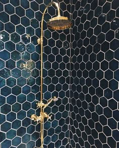 the shower head is gold in color