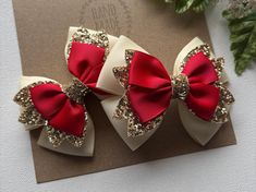 I love these bows !! Such cute ivory , gold, and red Christmas hair bows. The perfect Christmas accessories  to celebrate your little princess' Christmas or to visit Santa. My boutique hair bows are Light weight and attached to a no-slip alligator clips, perfect for girls of all ages.  Hair Bows  Measures Approx. 3.25" x 2.5" . Please reference the size before purchasing to ensure it is the size you would like. I do not accept returns.  Back to Pink hair bow boutiques store :  https://www.etsy.com/shop/PinkHairBowBoutique Christmas Hair Bows Ribbon, Gold And Red Christmas, Christmas Cheer Bows, Woman Costumes, Princess Christmas, Pigtail Hair Bows, Holiday Hair Bows, Bows Christmas, Bows For Girls