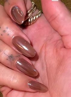 Hayley Bieber Nails Brown, Brownie Glazed Nails, Brown Iridescent Nails, Brown Shiny Nails, Chocolate Glazed Doughnut Nails, Shimmery Nails, Brown Glazed Nails, Russian Manicure Design, Donut Glaze Nails