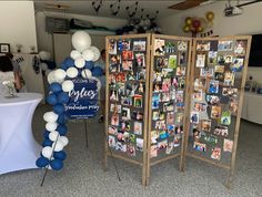 a room divider decorated with balloons and photos