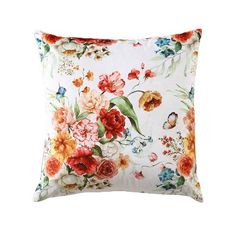 a white pillow with colorful flowers on it