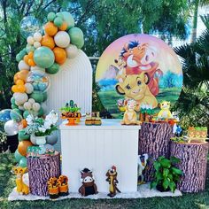 the lion king birthday party with balloons and decorations