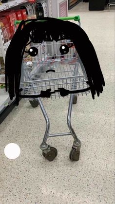 a shopping cart with a face drawn on it