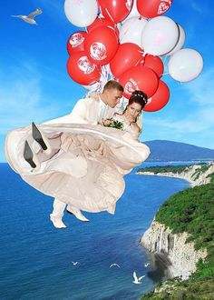 a man and woman are flying in the air with balloons