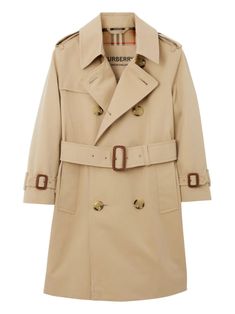 Beige cotton trench coat, notched lapels, button fastening at the shoulder, front button fastening, long sleeves, central rear vent, belted waist, two side slit pockets, straight hemComposition: Cotton, 100% North Face Parka, Cotton Trench Coat, Burberry Coat, Burberry Trench, Burberry Trench Coat, Burberry Kids, Classic Trench Coat, Gucci Kids, Kenzo Kids