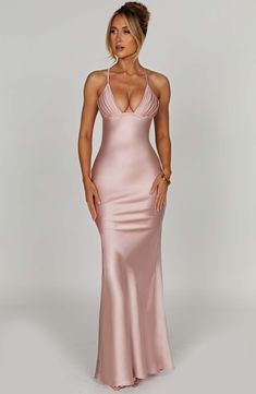 The sleek, sexy lines of Miriam make it the perfect choice for the most special occasions. Crafted from our premium bias cut satin that skims over the figure, this design drapes beautifully at the skirt and skims the floor with a maxi length. The look is is finished with a plunge neckline and pretty pleated cups.



Colour: Blush.

Premium bias cut satin.

Skims over figure.

Plunge neckline.

Pleated bust.

Halter straps.

Maxi length.

Model is an XS and is wearing an XS.

 Size: XS, S, M, L, Homecoming Dresses Corset, Sophia Miacova, Midi Dress Wedding Guest, Dresses Flowy, Maxi Dress Sale, Emo Outfits, Sparkle Dress, Plunge Neckline, Dresses By Length