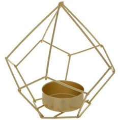 a gold geometric candle holder with a bowl in the center