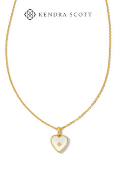 The Adalynn 18k Gold Vermeil Heart Pendant Necklace in Ivory Mother-of-Pearl features everything we love: artful design, quality materials, and the perfect pop of sparkle. A bursting heart with etched detailing, this pendant really shines with its white sapphire center and 18k Gold Vermeil chain. It’s the pendant that’ll last for years to come and will make the perfect addition to your everyday rotation. White Pearl Pendant Heart Necklace For Anniversary, White Pearl Charm Heart Necklace For Anniversary, White Heart Necklace With Pearl Charm For Anniversary, White Heart Pendant Necklace With Pearl Charm, White Pearl Charm Pendant Heart Necklace, 14k Gold Polished Heart Pendant Necklace, White Heart Necklace With Pearl Charm, Kendra Scott White Heart Necklace, Kendra Scott Gold Heart Necklace