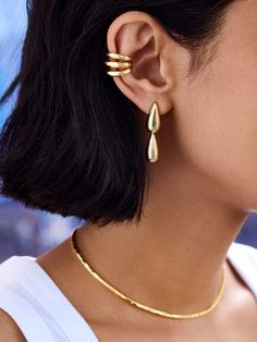 No tears, just gorgeous teardrop earrings that magically level up any look. Introducing the Zoe Earrings, double teardrop drop earrings. Available in gold, silver, these earrings are perfect for chic, everyday styling or cool, elevated ear stacks.