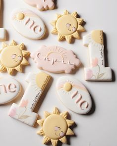 some decorated cookies are laying on a table