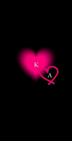 a pink heart with the letter k in it's center on a black background