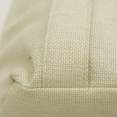 a close up view of the back end of a pillow