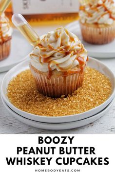 boozy peanut butter whiskey cupcakes on a white plate