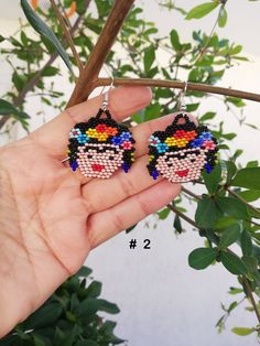 All of our earrings are made with sterling silver hooks, they are made of 925 sterling silver and the clasps of the earrings are made of transparent silicone. Especially for people with mild sensitivity. Beaded earrings, mexican earrings, huichol art, gift for her. Beaded jewelry made of beads is an important element of the Huichol clothing, the use both women and men, especially certain necklaces, earrings and bracelets. Huichol art and handicrafts are recognized worldwide and are setting trend Handmade Multicolor Beaded Artsy Earrings, Artsy Handmade Multicolor Beaded Earrings, Artsy Multicolor Handmade Beaded Earrings, Handmade Adjustable Artsy Beaded Earrings, Handmade Artsy Beaded Earrings, Artsy Earrings With Colorful Beads As Gift, Artsy Colorful Beaded Earrings As Gift, Artsy Colorful Beaded Earrings For Gifts, Huichol Clothing